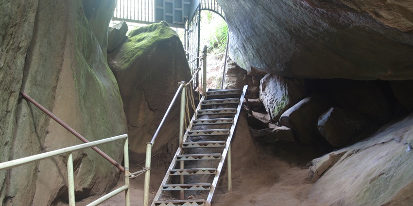 Edakkal Cave, featuring ancient rock and rugged cave walls - near Thirunelli temple.