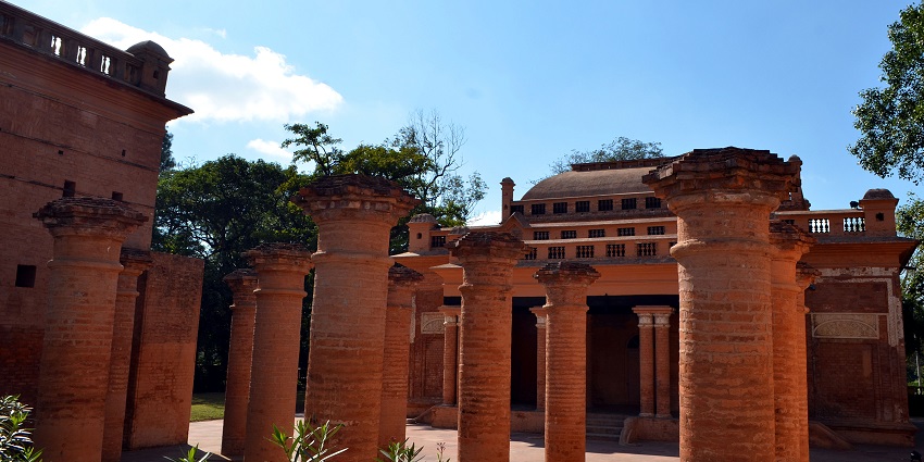 Image of interior of the fort, with historic structures and well-maintained pathways.