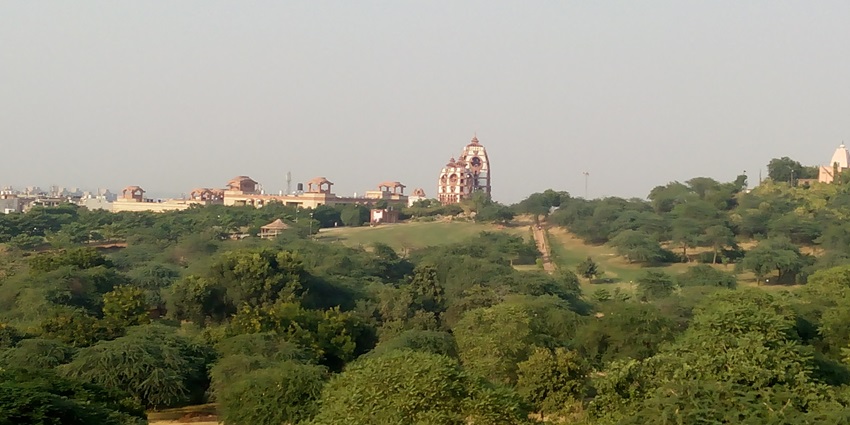 Beautiful panoramic image of the ISKCON Dwarka amidst the lush greenery