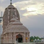 A glimpse of a famous tourist attraction standing against the backdrop of scenic skies.