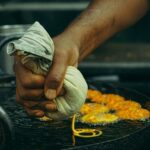 A mouth-watering picture of jalebi that is being served at one of the stalls.