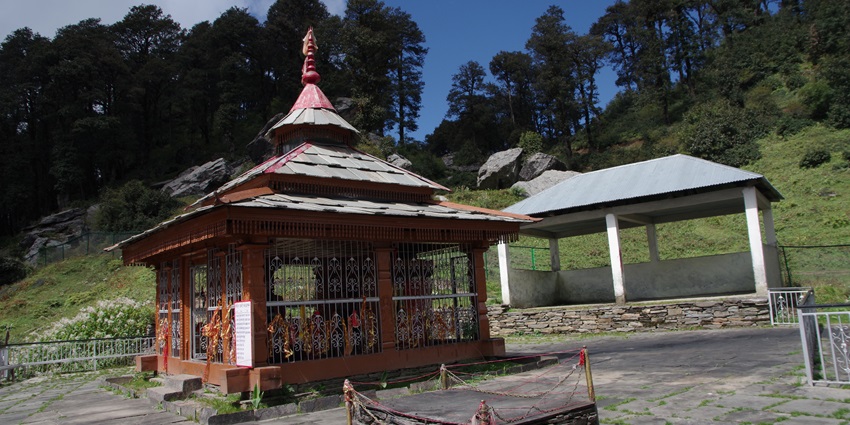 A temple near a lake in Jibhi's hills