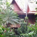 Scenic snapshot of the Jim Thompson House Museum surrounded by beautiful flowers