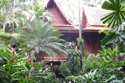 Scenic snapshot of the Jim Thompson House Museum surrounded by beautiful flowers