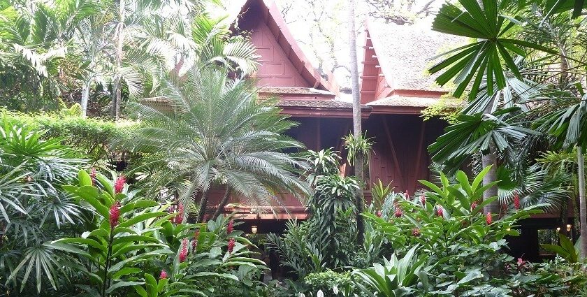 Scenic snapshot of the Jim Thompson House Museum surrounded by beautiful flowers