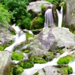 Panoramic image of the beautiful Jogini waterfalls amidst the lap of Himalaya