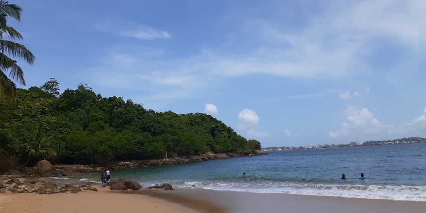 A glimpse of the cobalt blue waters and pristine golden sands of Jungle Beach, Sri Lanka.