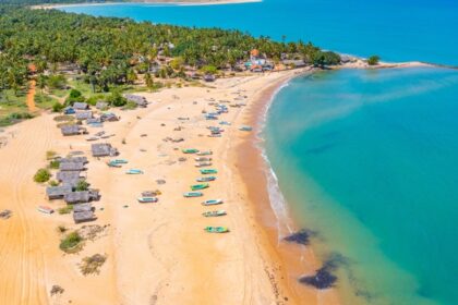 An aerial view of clear waters and green landscapes in mesmerising Kalpitiya Beach.