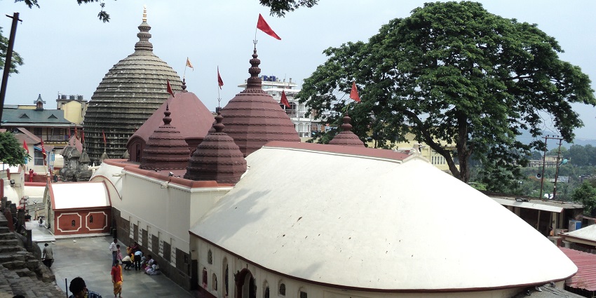 Kamakhya, with detailed carvings and bustling temple activity - things to do in Assam