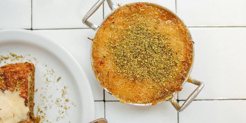 Do include the sweet dish Kanafeh to your list of must-try cuisines in the emirates city.