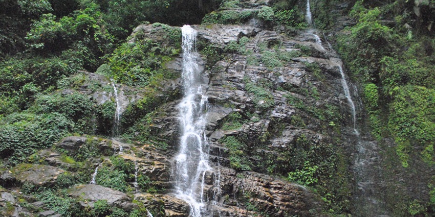 Kanchenjunga Falls is one of the most majestic places to visit around Tashiding Monastery.