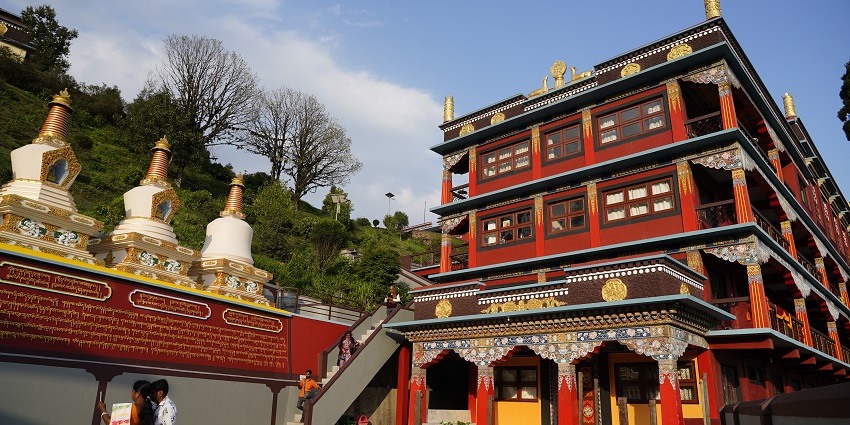 An image of a holy place for Buddhists with beautiful cloudy skies in the background.
