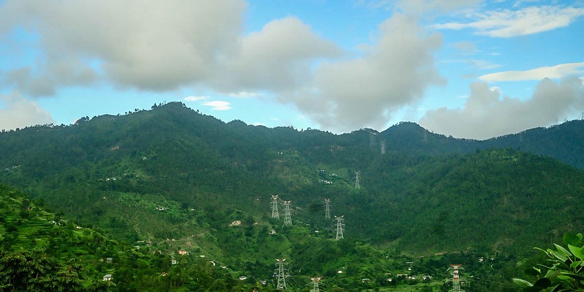 An alluring view of the Karsog Valley with a cloudy sky, located in Himachal Pradesh.