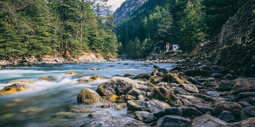 A scenic view of Kasol river, one of the picturesque places near Kais Wildlife Sanctuary.