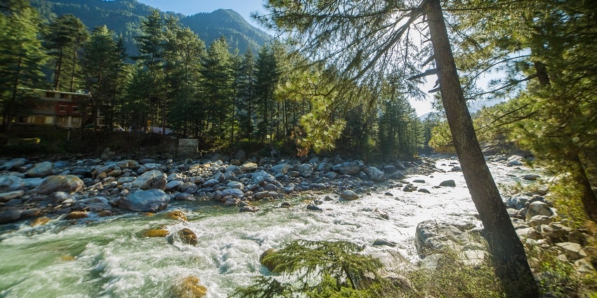 The Parvati River in Kasol is a sight worth seeing as it is dotted with snow-laden cottages
