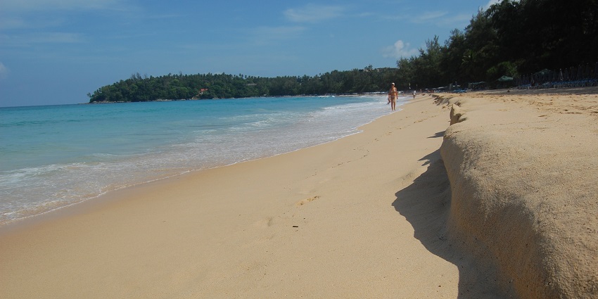 Azure waters meeting the golden sands at Kata Beach, one of the best beaches in Phuket.