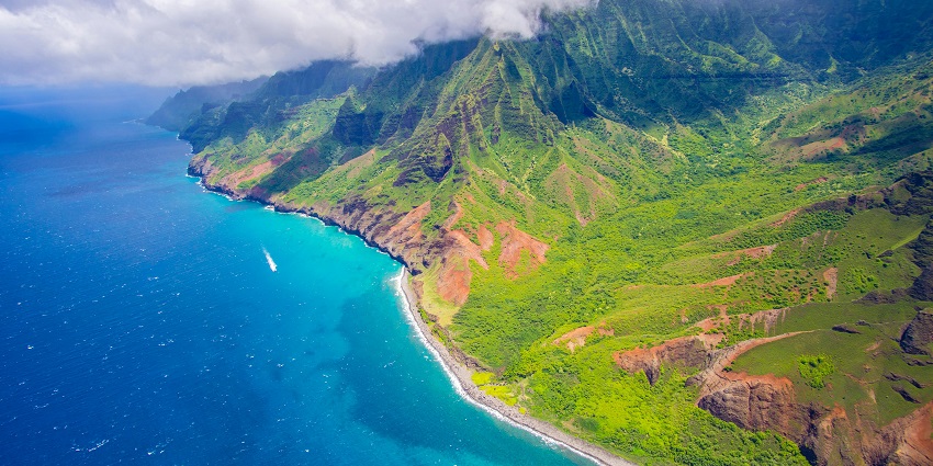 Kauai is also known as Garden Isle because of the lush vegetation and palm trees.