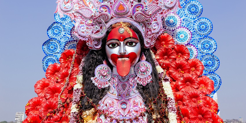 Idol of Goddess Kali awaiting immersion during the Visarjan ceremony in the River.