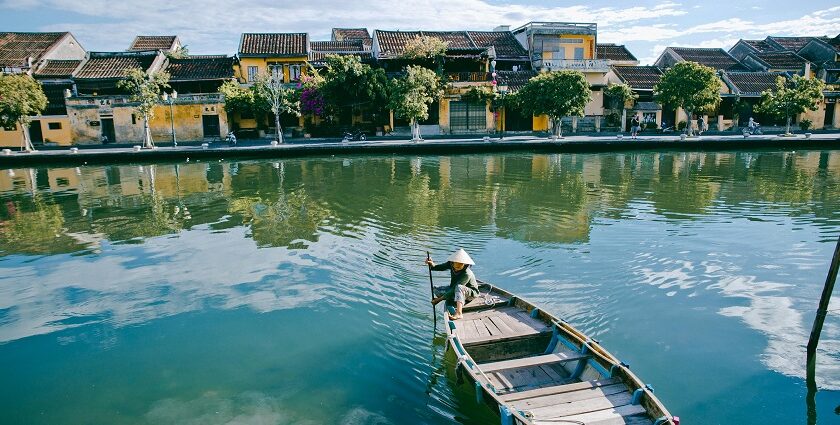 Kayak vietnam- Snapshot of a person in a boat steering the way in water.