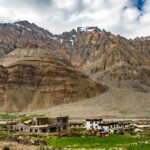 A scenic view of mountains towering Kaza, a quaint location in Himachal Pradesh.