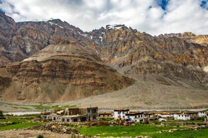 A scenic view of mountains towering Kaza, a quaint location in Himachal Pradesh.