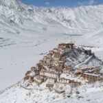 An image of the Key Monastery covered in snow, in Spiti Valley, Himachal Pradesh.