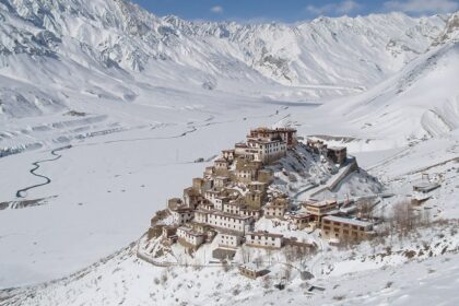 An image of the Key Monastery covered in snow, in Spiti Valley, Himachal Pradesh.