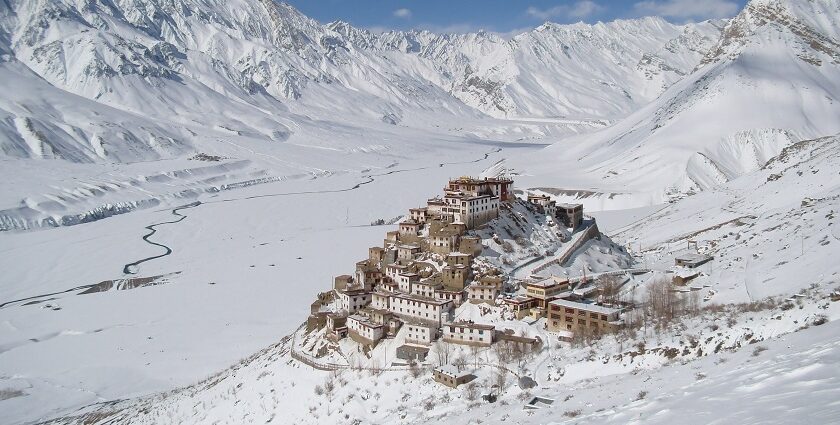 An image of the Key Monastery covered in snow, in Spiti Valley, Himachal Pradesh.