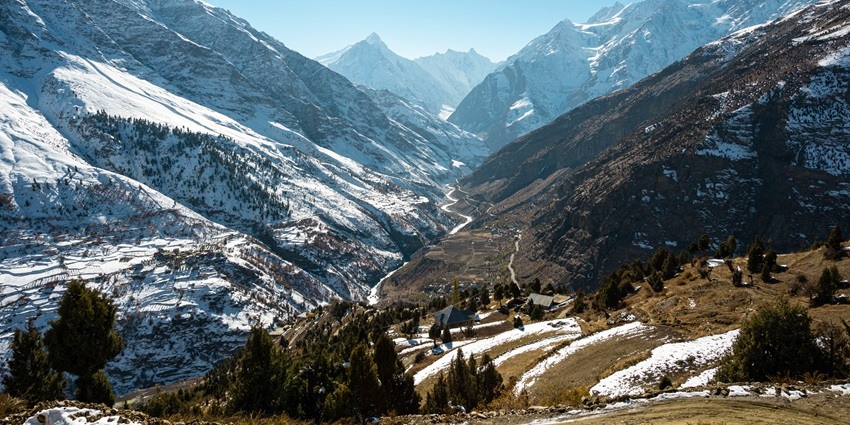 A picture of mountains taken from a monastery near Keylong