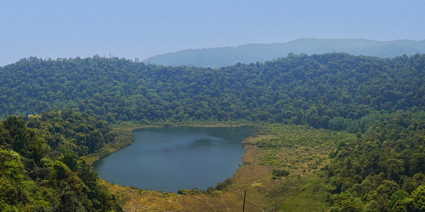 This lake is revered as a holy spot to fulfil wishes, with lush greenery surrounding it in a picturesque manner.