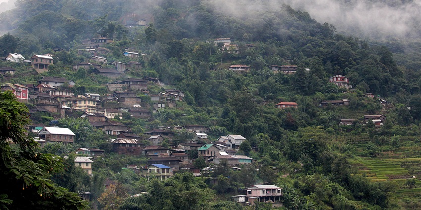 Beautiful image of Khonoma Village surrounded in mist—Places to visit in Kohima