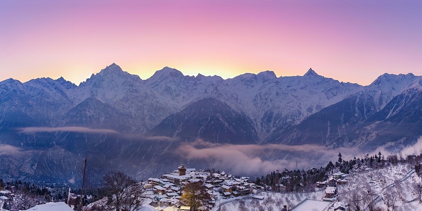 Kinner Kailash Range and the town of Kalpa as seen at dawn. The highest twin peaks of Kinner Kailash