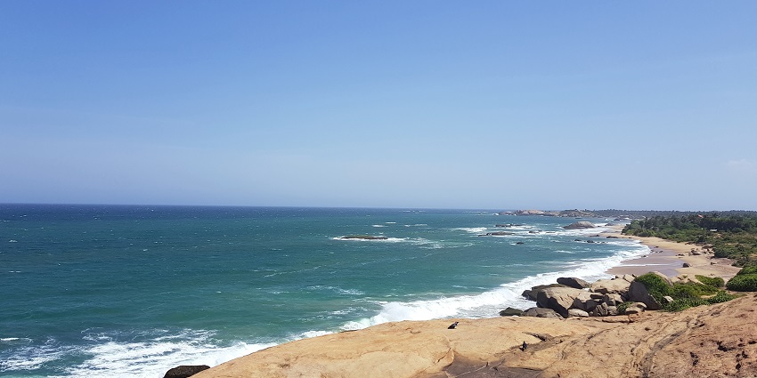 A scenic view of Kirinda Beach, one of the best spots to try scuba diving in Sri Lanka.