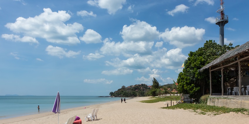 A scenic view of pristine sands and glistening waters of beautiful Klong Nin Beach.