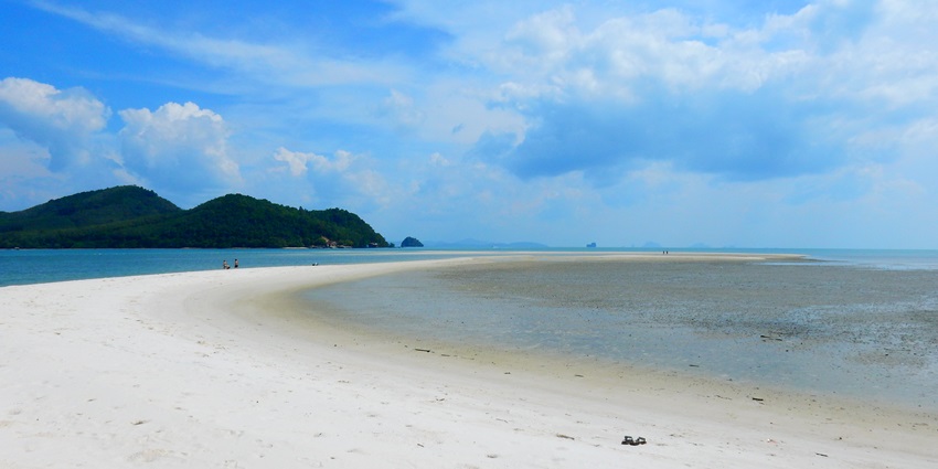 A glimpse of pristine white sands submerging with the azure waters of Ko Yao Yai.