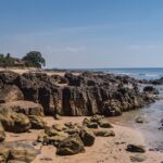 An island with big rocks on the sea shore