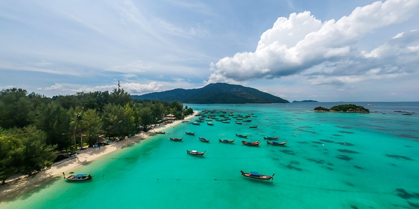 An aerial view of azure waters of Koh Lipe, one of the top offbeat places in Thailand.