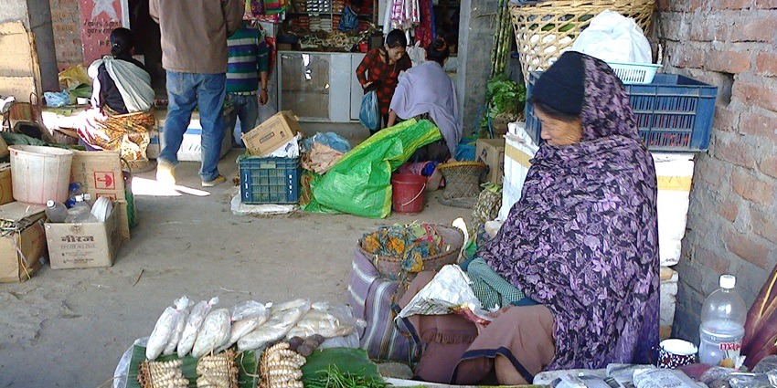 Kohima Market bustling with vendors and shoppers, offering a variety of local goods.