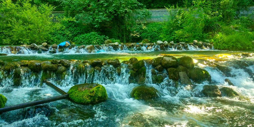 Kokernag Waterfall is located amidst green fields and flower gardens and is a sight to behold