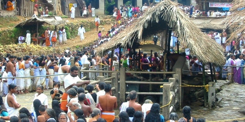 Seek blessings from Kottiyoor Siva Temple, a place to visit near the beautiful waterfall.