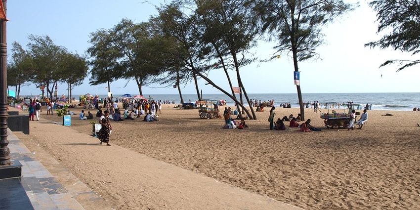 Kozhikode Beach featuring golden sands, calm waters, and vibrant local culture.