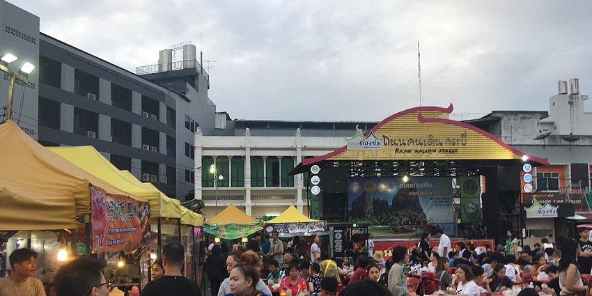 Try souvenirs or savour local snacks when exploring the Krabi Town Walking Street
