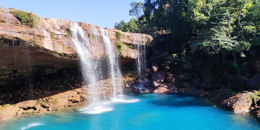 Withess the beautiful views of the majestic Krang Suri Falls located in Meghalaya, India.