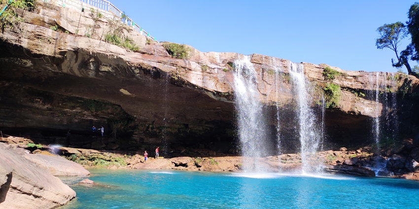 A scenic view of Krang Suri Falls, one of the best places to visit in Meghalaya in June.