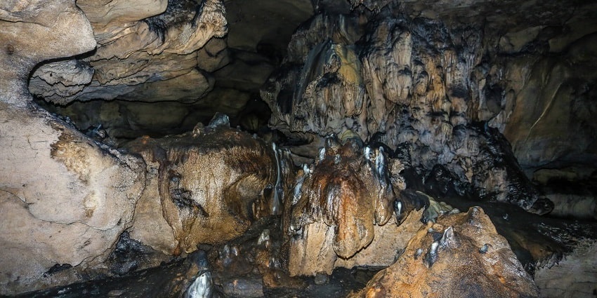 Khomuli Cave, featuring remarkable rock patterns, is one of the caves in Cherrapunji.