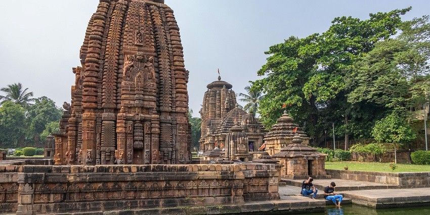 View of the amazing architecture of a place of praying with lush greenery in surroundings.