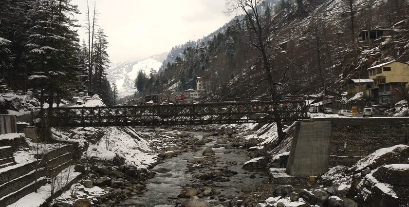 A scenic image of an iron bridge over a stream of river near Kalath Hot Spring.