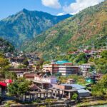 View of Beas River winding through hills - Places to visit in Kullu Manali in December.