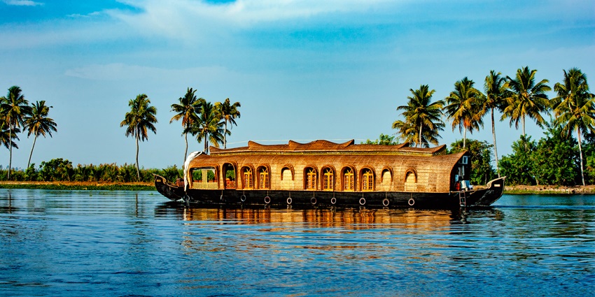 A houseboat on the Kumarakom Backwaters one of the best places to see in Kumarakom