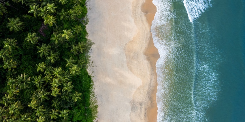 Snap of a Golden Beach meeting the Blue Ocean - Best places to visit in Kumarakom